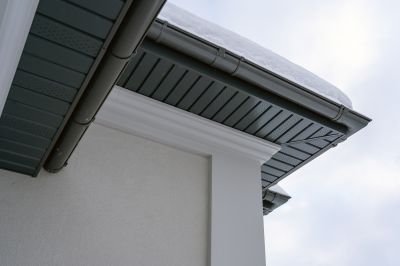 Gutter Installation on a Residential Roof